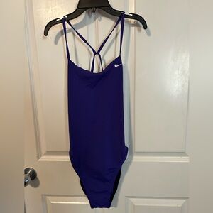 Women’s Nike purple swimsuit size 1090% polyester 10% spandex, nikebetterworld.